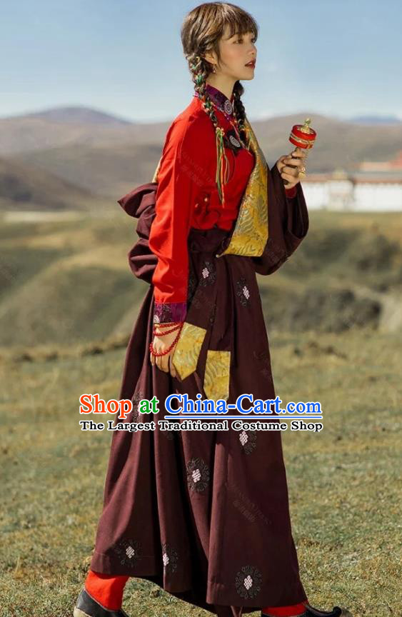 China Traditional Xizang Minority Young Lady Wine Red Tibetan Robe Zang Nationality Folk Dance Clothing